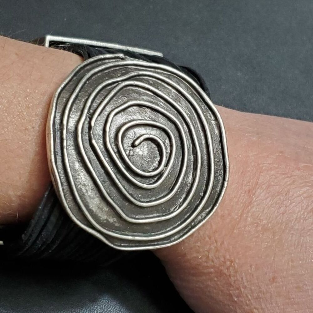 Silver tone swirl with black cord bracelet 7-9"